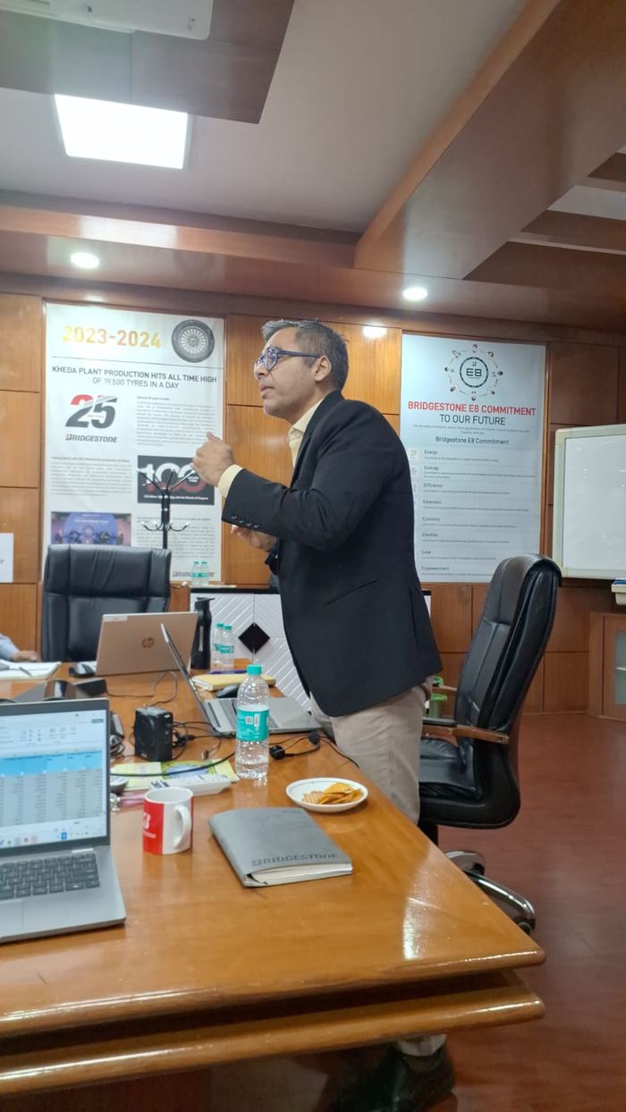 Faiyaz teaching a session in the Bridgestone training room
